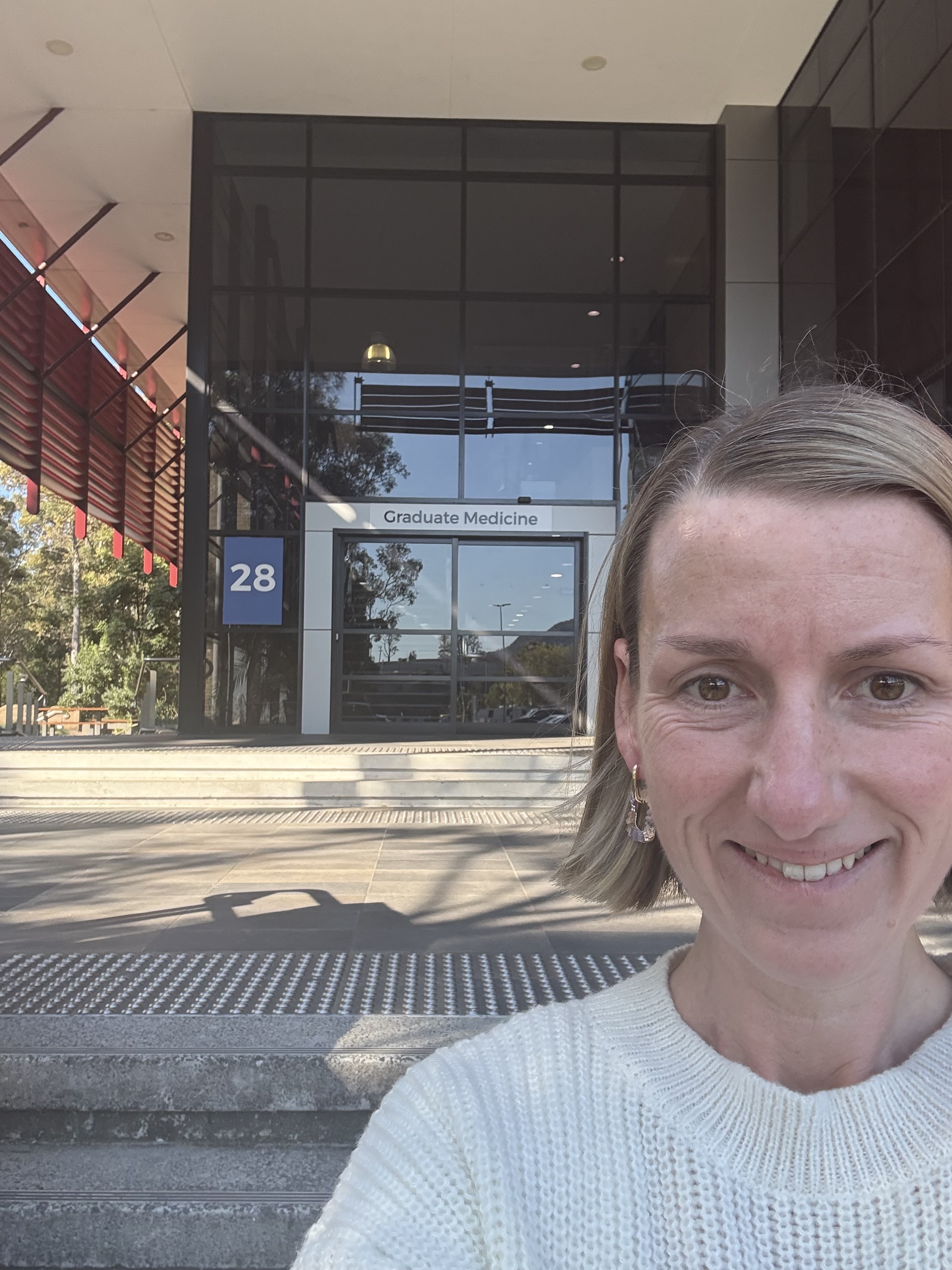 Dr Rebekah Hoffman outside the UOW Graduate Medicine building